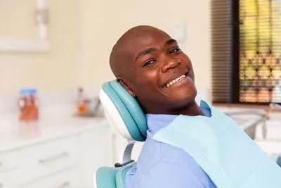 patient smiling during his visit to Southard Family Dentistry