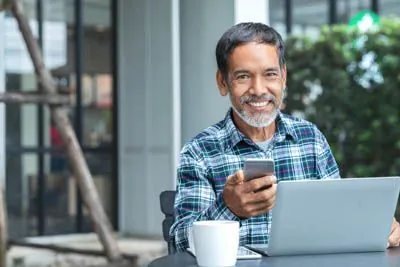 man scheduling a dental appointment at Southard Family Dentistry