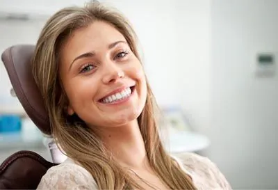 woman smiling during her dental appointment at Southard Family Dentistry