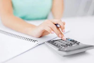 woman using a calculator