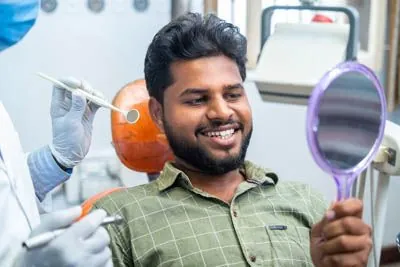 man satisfied with the results of his dental work at Southard Family Dentistry