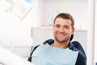 patient smiling during his visit to Southard Family Dentistry