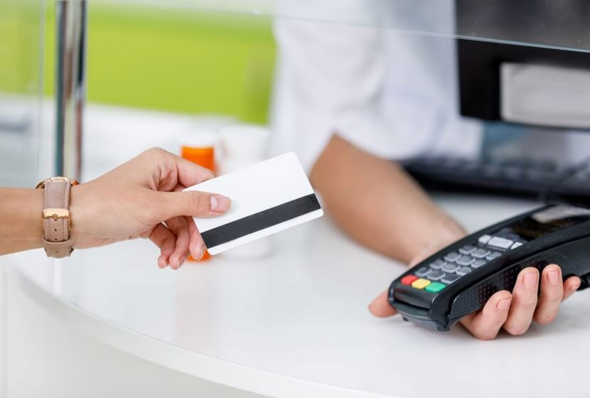 patient paying for their dental services at Southard Family Dentistry